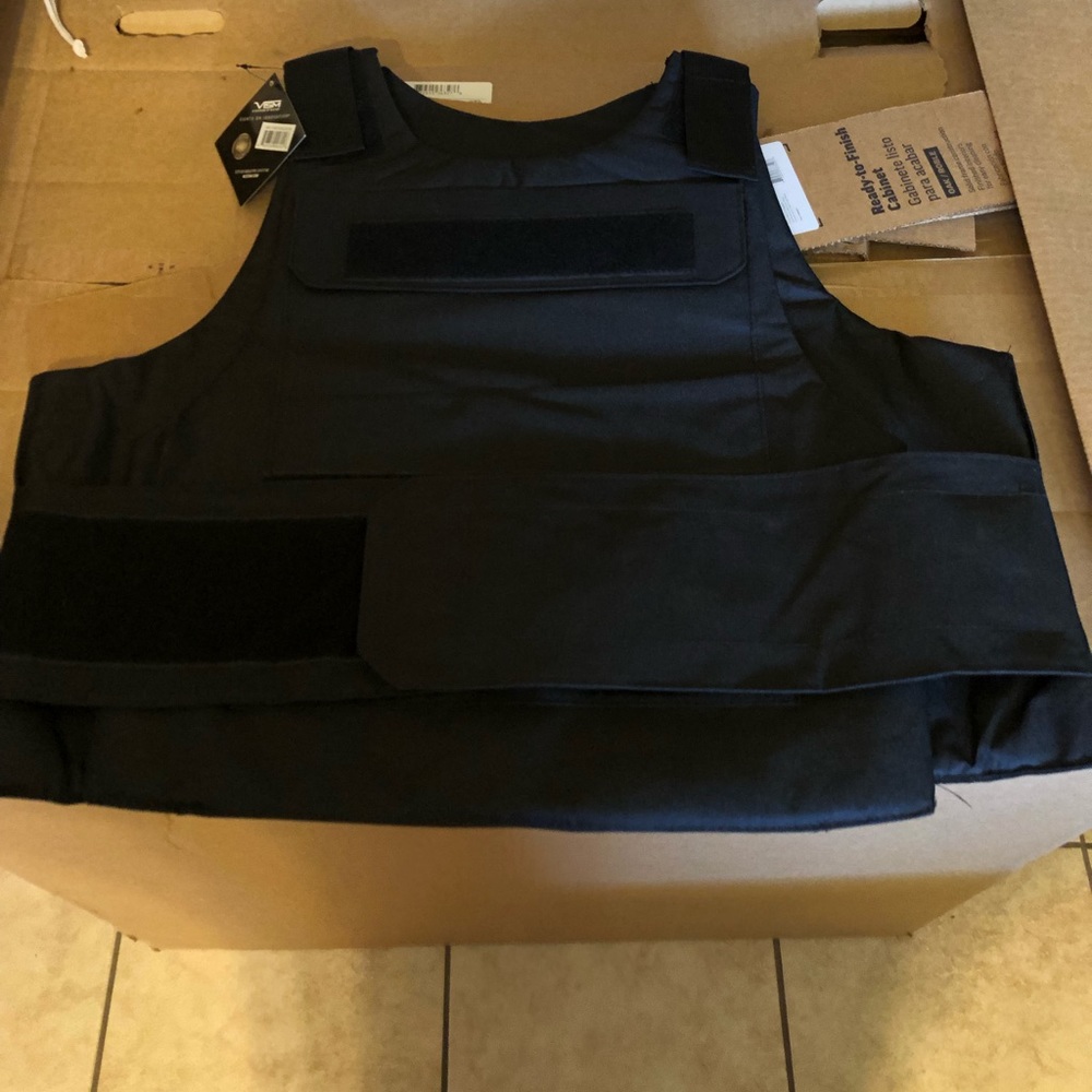 Xl plate carry workout/ protection vest made from Teflon material.